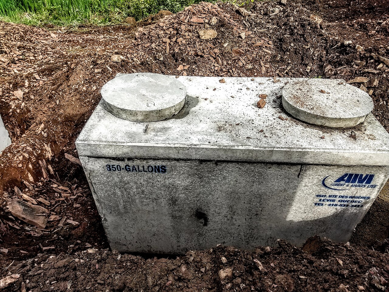 Septic tank positioned in an excavation